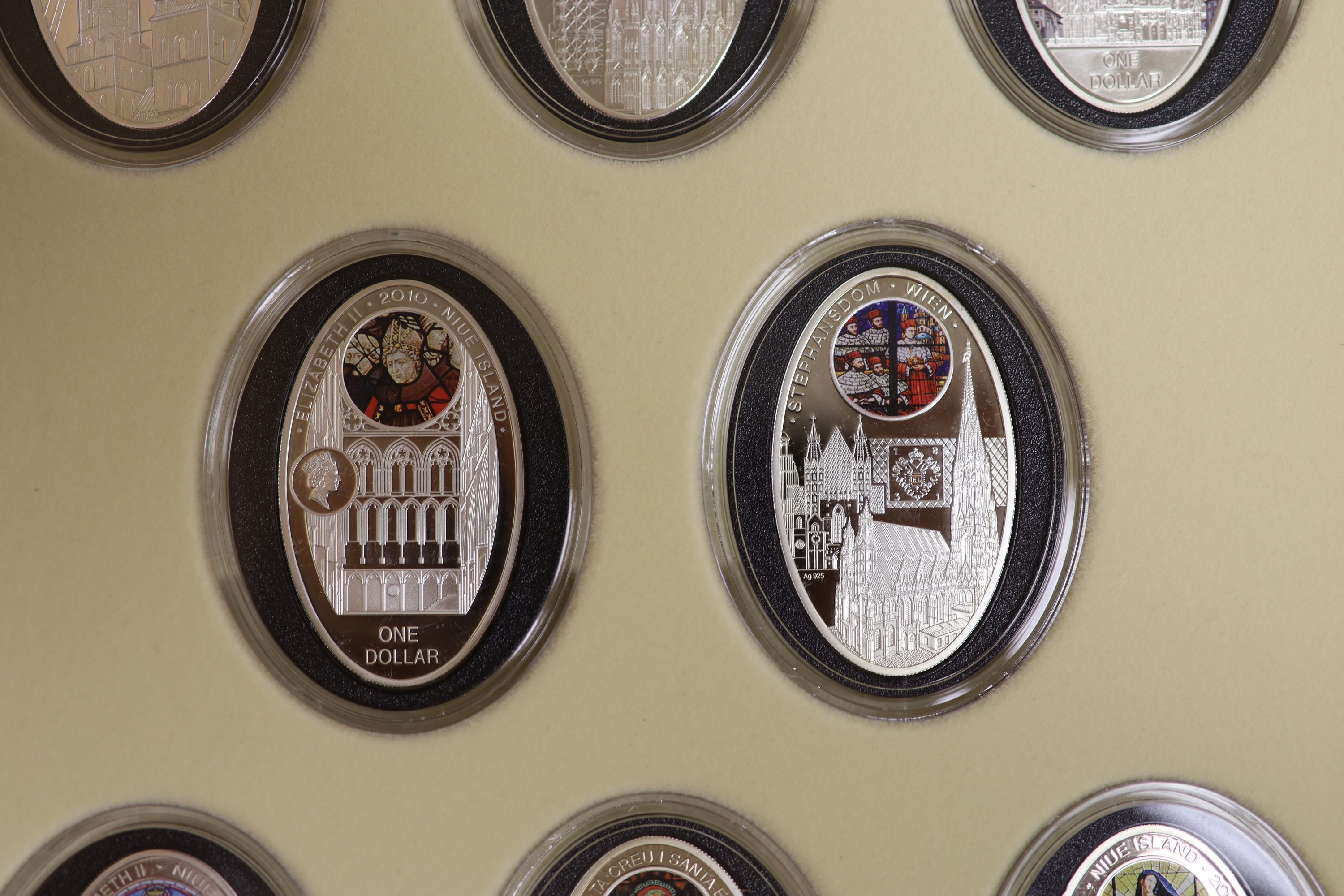 A BH Meyer Mint Niue Island cased set of eight $1 proof coins, each 28.28g